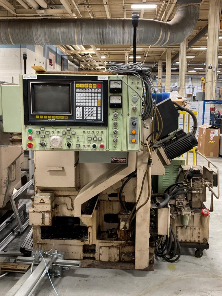 Available Now Okuma Lathe & Vertical Chip Conveyor Schneider Industries
